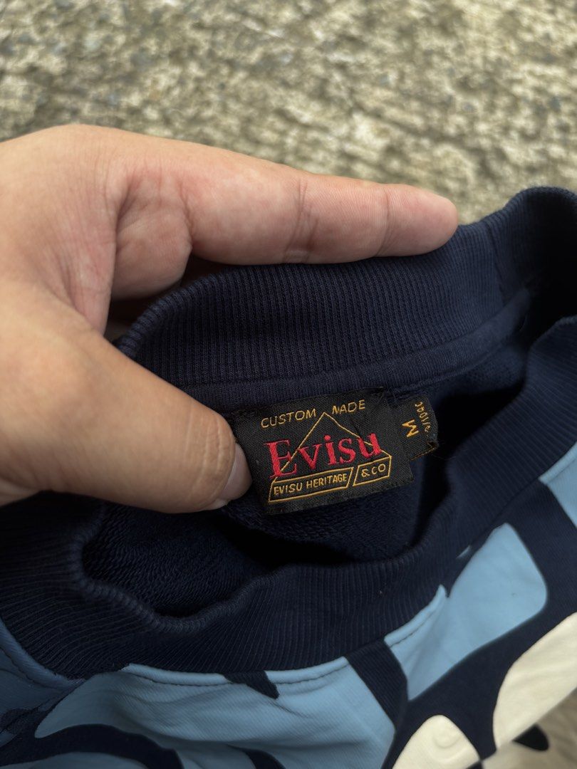 EVISU FW22 AOP Wave Pattern Letter Print Pullover Sweatshirt (Category: Coats, Jackets and Outerwear) located in Caloocan City. Submitted by neweagle-424b (Listing ID 1466105323, Image 3). Description: Dimes : W 26 x 26 L boxy type excellent condition ✅ novaliches qc metro manila dm not thrifted gift to japan made .