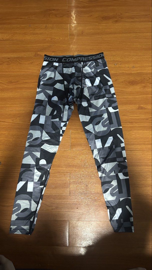 Exercise EPRO Compression Leggings Black Grey Geometric Print (Category: Activewear) located in Marikina City. Submitted by extremezone3_746 (Listing ID 1466001305, Image 2). Description: Fits SMALL TO MEDIUM - Brand: Exercise EPRO - Design: Stylish black, grey, and white geometric pattern - Fit: Fitted style with a comfortable wide elastic waistband and branded text - Performance: Highly stretchable material, perfect for workouts, running, or ac