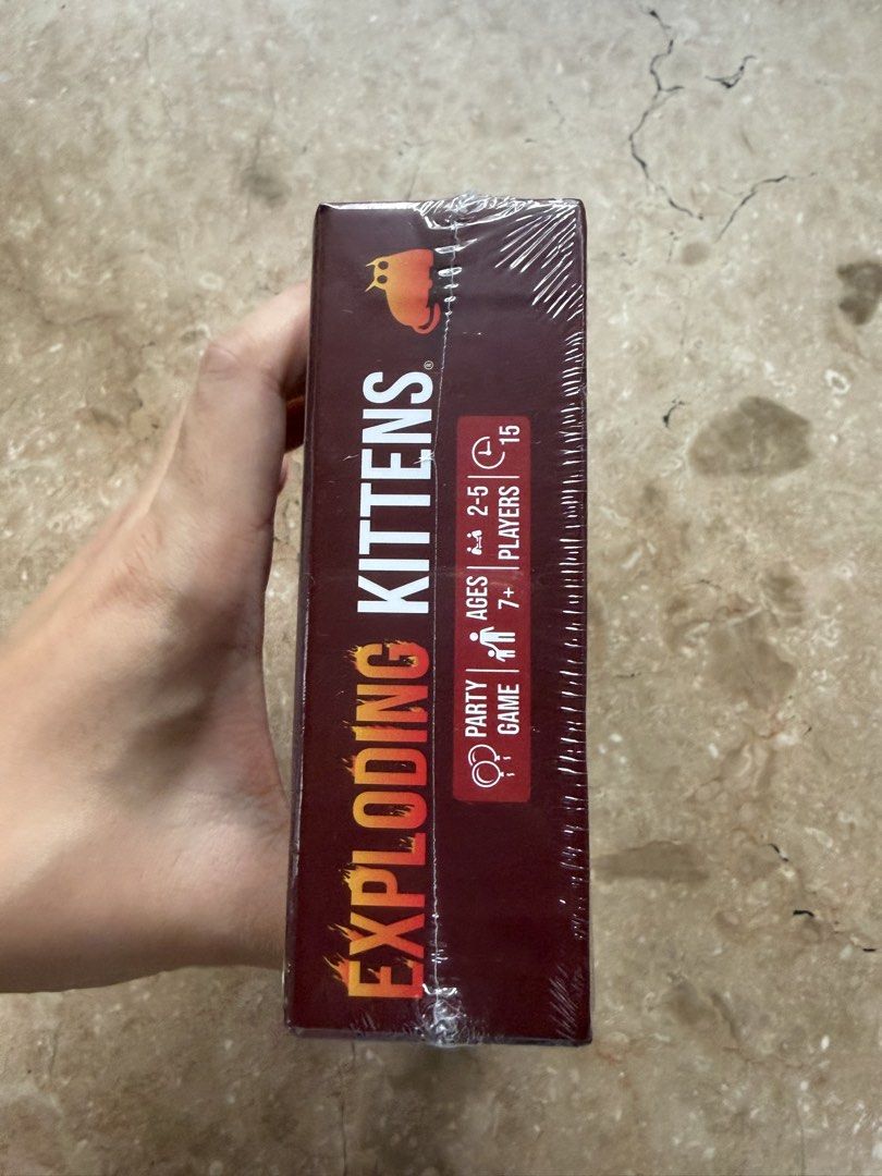 Exploding Kittens Card Game: Original Edition (Category: Board Games & Puzzles) located in Quezon City. Submitted by tidyup.lara (Listing ID 1466154908, Image 3). Description: Sold as is Condition 9/10: brand new and sealed in its original shrink wrap.