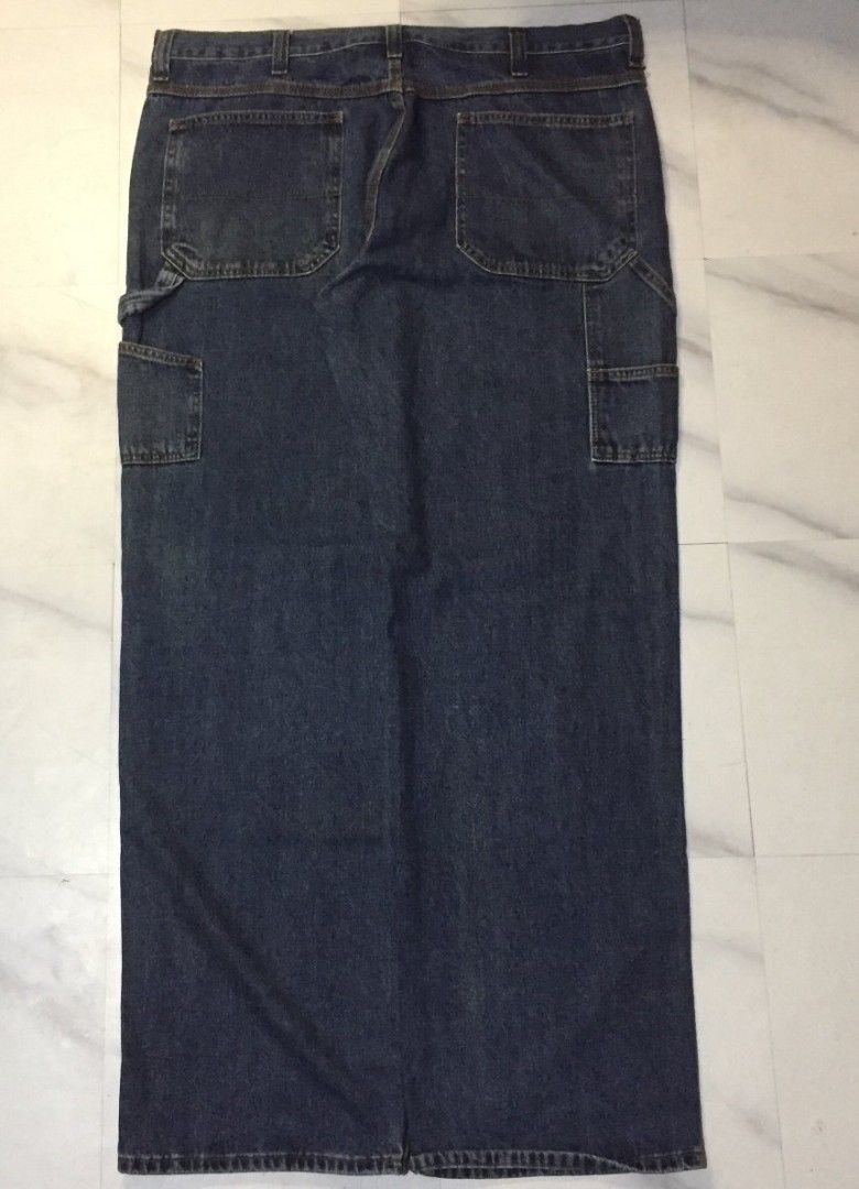 Faded Glory Carpenter Jeans 38x34 Dark Wash (Category: Jeans) located in Imus. Submitted by thrifts_select (Listing ID 1465996275, Image 2). Description: - Brand/Model: Faded Glory Carpenter Jeans - Size: 38x34 - Color: Dark wash with consistent coloring - Material: 100% cotton - Features: Utility side pockets, hammer loop, standard button fly, belt loops - Fit: Straight leg cut - Condition: Clean material throughout.
