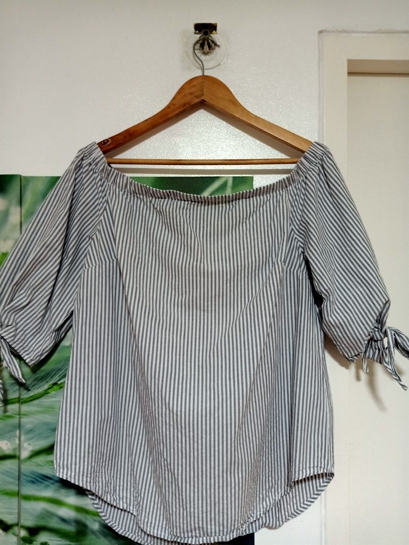 Faded Glory Off Shoulder Blouse (Category: Blouses) located in Mandaluyong City. Submitted by miyakiko (Listing ID 1466055261, Image 3). Description: Selling Faded Glory off shoulder blouse with gray and white vertical striped with tie cuffs. Size: Large -XL-XXL Price: P180.