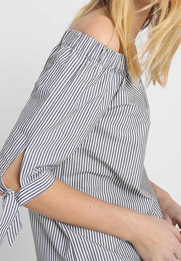 Faded Glory Off Shoulder Blouse (Category: Blouses) located in Mandaluyong City. Submitted by miyakiko (Listing ID 1466055261, Image 1). Description: Selling Faded Glory off shoulder blouse with gray and white vertical striped with tie cuffs. Size: Large -XL-XXL Price: P180.