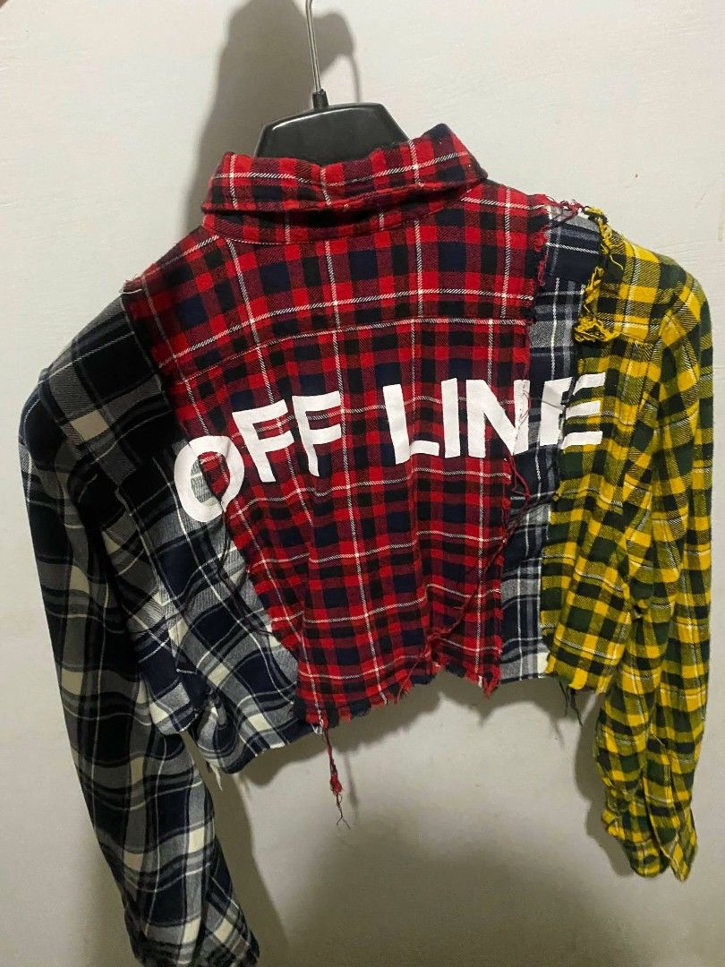 Fashion Nova Multi-Pattern Colorblock Flannel Crop Top (Category: Sleeveless) located in Manila. Submitted by ilovesoobin_13 (Listing ID 1466083641, Image 2). Description: - Brand: Fashion Nova - Style: Patchwork flannel crop top with raw hem - Size: Medium - Details: Long sleeves, button-down front, and dual chest pockets - Design: Mismatched red, yellow, and black-and-white plaid with a large "OFF LINE" back graphic.