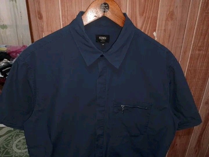 FENDI (Category: Tshirts & Polo Shirts ) located in Taguig. Submitted by clothingselection (Listing ID 1465968968, Image 3). Description: PTPA FENDI CLASSIC POLO SHORT SLEEVE POLO BUTTON DOWN WIDTH 21.5 LENGTH 27 VERYGOOD CONDITION NID WASH FRESH FROM BALE.