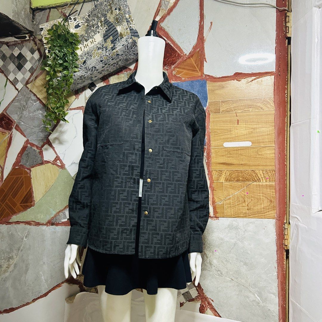 Fendi soft denim jacket (Category: Luxury Apparel) located in Baguio. Submitted by kckc_luxury (Listing ID 1466085578, Image 2). Description: 🌸 TINY PINK SPOTS ARE LENS DAMAGE, NOT CLOTH STAINS ————————— ❗️KINDLY READ BEFORE MAKING AN OFFER❗️ LISTING DETAILS size:M width x length (inches):21x26 condition: EXCELLENT --- MOP: Gcash / BPI MOD: J&T / JRS LOCATION: Baguio City --- NOTE: • Manage your expectations • Photos did not go under any edit bu