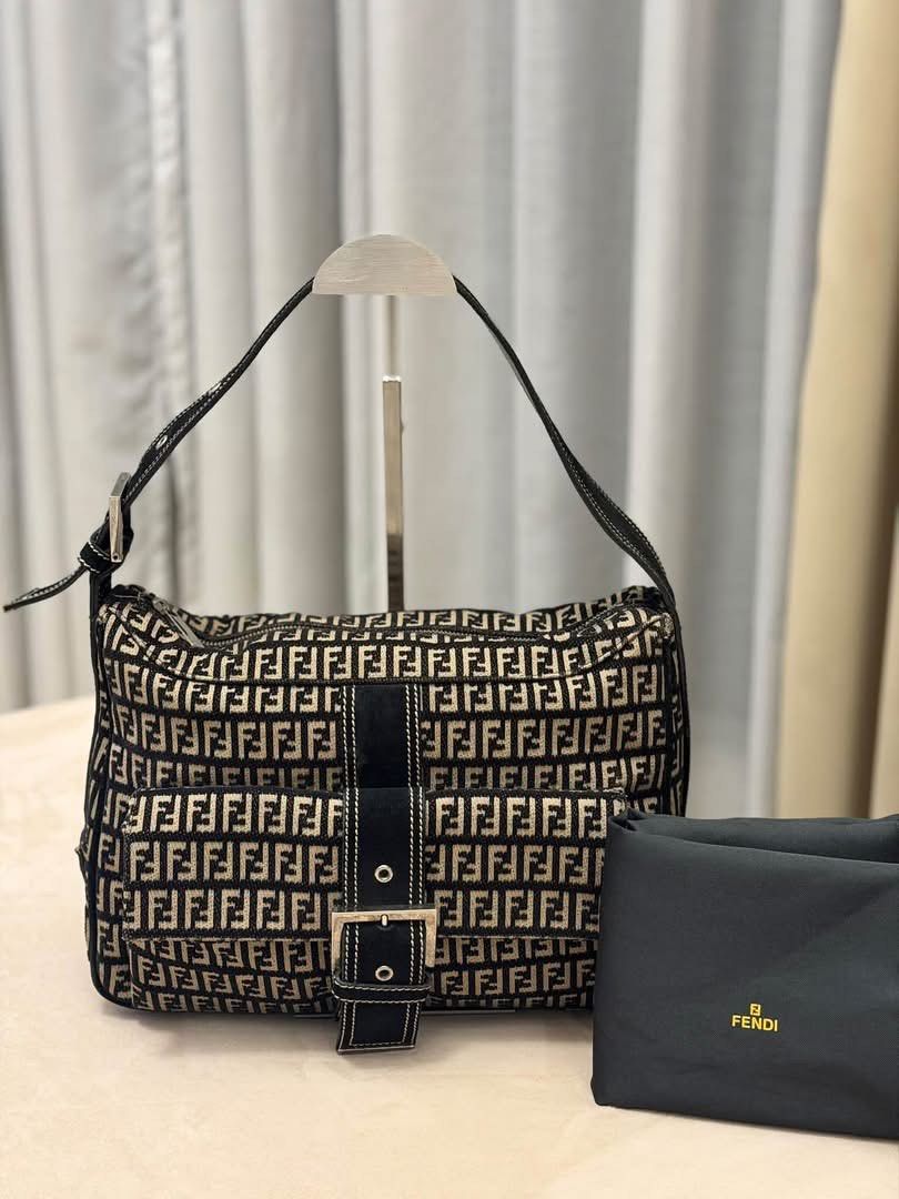 Fendi Zucchino Canvas Shoulder Bag (Category: Luxury Bags & Wallets) located in Manila. Submitted by ianreys (Listing ID 1466109912, Image 1). Description: Fendi Zucchino Canvas Shoulder Bag 💯% Auth W/ dust bag only.