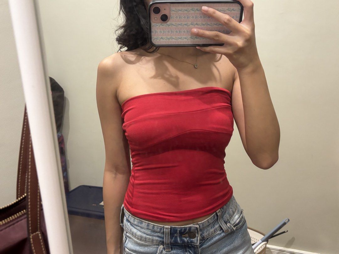 Fhilar red strapless tube top (Category: Sleeveless) located in Paranaque City. Submitted by domisclosett (Listing ID 1466092004, Image 2). Description: - Color: Vibrant red - Style: Strapless tube top with a straight neckline - Fit: Form-fitting with a soft, comfortable stretch loc: parañaque/muntinlupa area mop: gcash, maribank, gotyme mod: lalamove or j&t, sf c/o buyer.