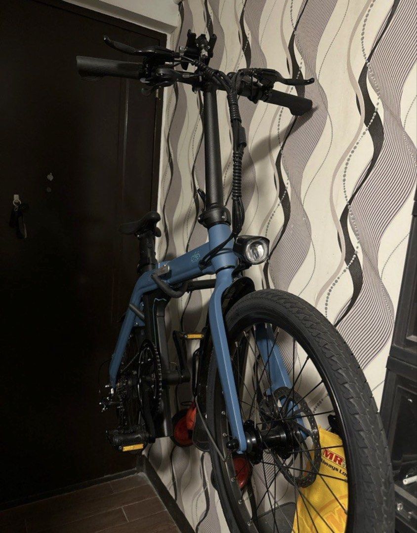 Fiido D11 Folding Electric Bike for sale or swap to macbook M series (Category: Bicycles) located in Muntinlupa City. Submitted by clairebobot (Listing ID 1466150983, Image 3). Description: - Model: Fiido Folding Electric Bike - Color: Vibrant Blue - Display: Digital screen showing battery level and odometer - Lighting: Bright LED headlight upfront - Design: Compact folding frame for hassle-free storage and commuting - Condition: Clean finish, fu