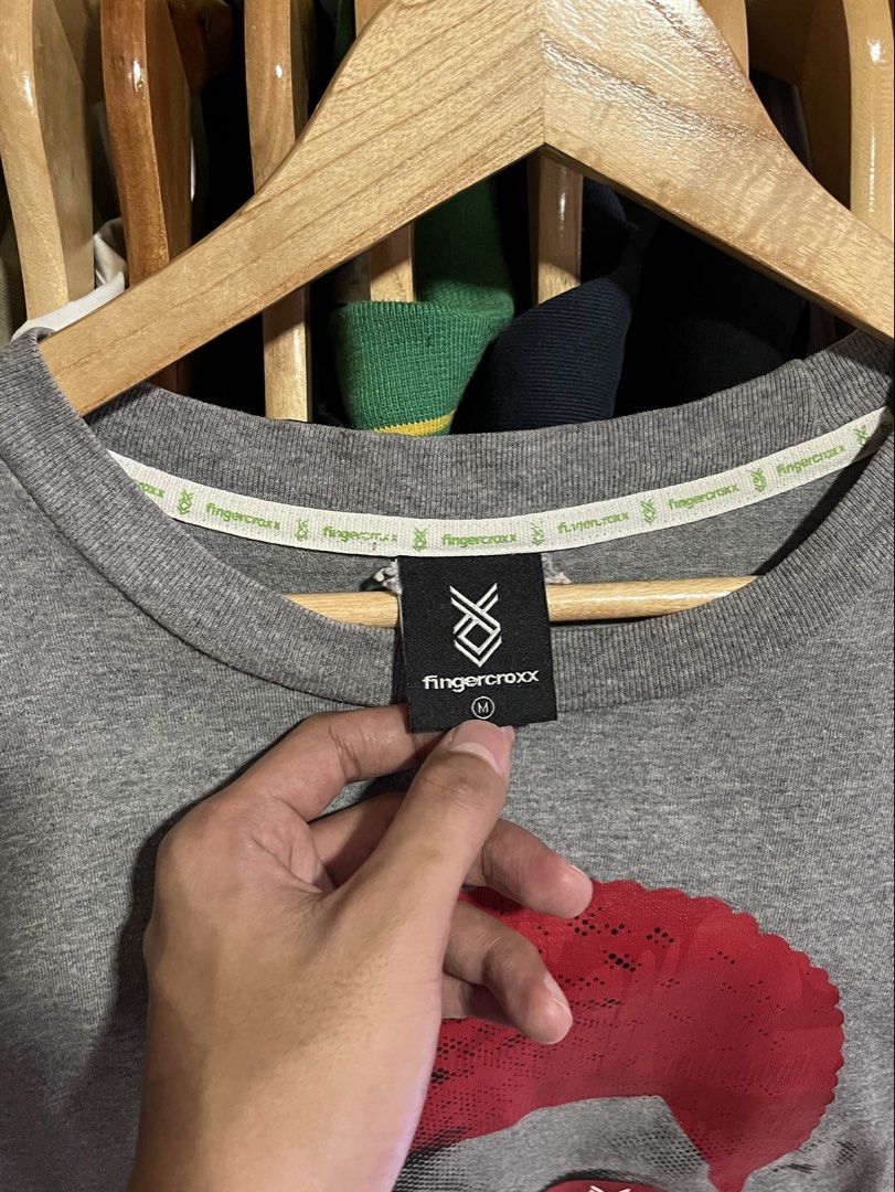 Fingercroxx x Dennis Rodman graphic tee (Category: Formal Shirts) located in Leyte. Submitted by drn_rags (Listing ID 1465994141, Image 3). Description: Fingercroxx x Dennis Rodman graphic tee Excellent condition Width: 18 Length: 28 Size medium on tag .