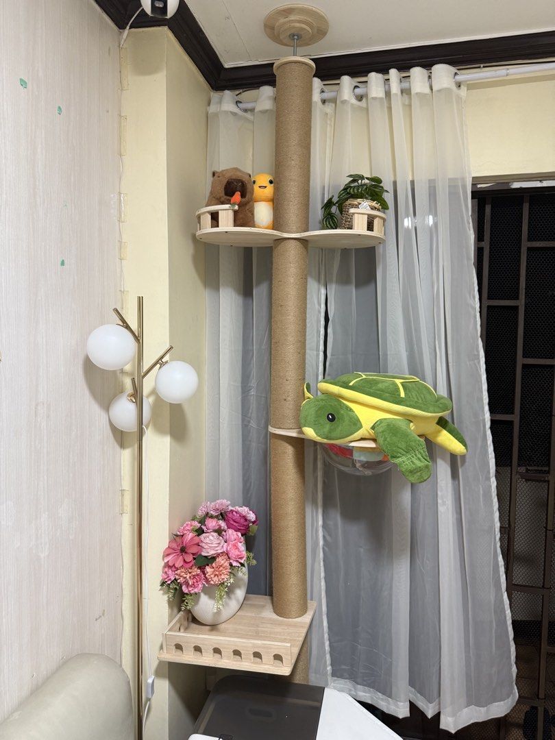 Floor to Ceiling Cat Tree Scratching Post with Platforms (Category: Homes & Other Pet Accessories) located in Manila. Submitted by marcee (Listing ID 1466081347, Image 3). Description: -Floor-to-ceiling cat tree with sturdy tension-mount design - Features natural sisal scratching posts to protect your furniture - Includes 2 upper platforms, a popular clear acrylic bowl perch, and a lower wooden step - Neutral wood and tan tones easily match any r