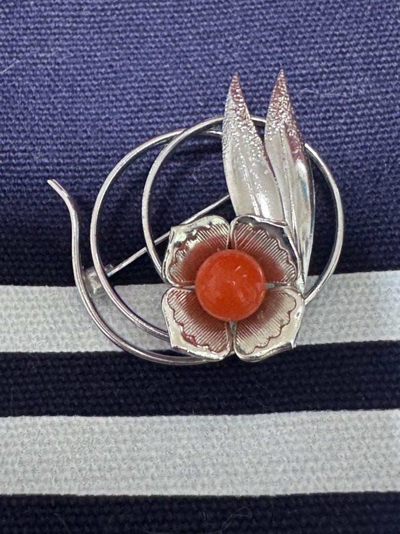 Floral brooch coral (Category: Luxury Accessories) located in Marikina City. Submitted by luvbags40524 (Listing ID 1466012434, Image 1). Description: Good condition Vintage silver tone floral brooch Featuring a central orange coral Textured leaf and wire-loop accents Dm for interested .