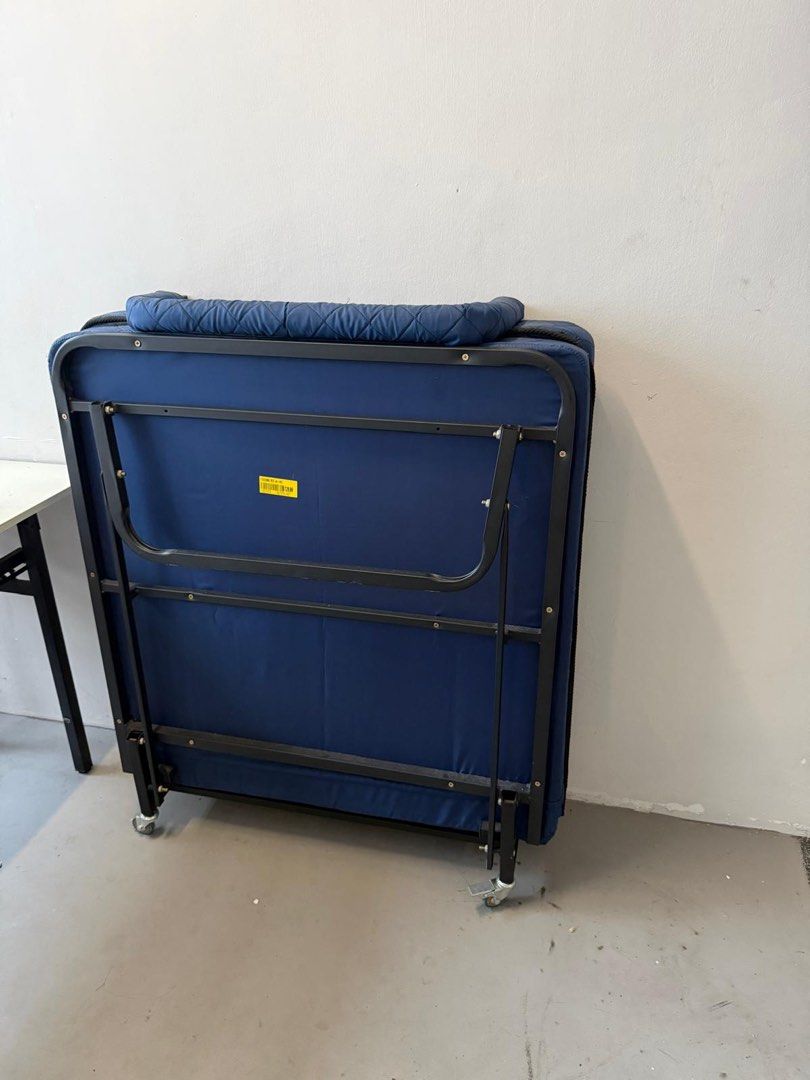 Foldable bed (Category: Bed Frames & Mattresses) located in Singapore. Submitted by silentphoenix86tiger (Listing ID 1466111513, Image 1). Description: Foldable single bed with attached mattress including wheels for easy moving used only few times maybe less then a week Bought is Mustafa for 110+.