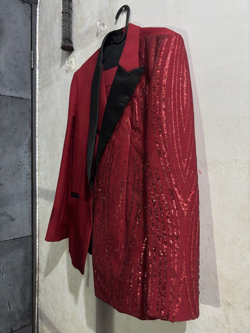 FOR RENT & SALE! Red Black Split Sequin Tuxedo Jacket (Category: Coats, Jackets and Outerwear) located in Makati City. Submitted by idol_station (Listing ID 1466107074, Image 3). Description: FOR RENT & FOR SALE FREESIZE MOP: GCASH MOD: Lalamove or pick up - Bold red and black split design with one solid side and one sequined side - Elegant black satin lapels and pocket trim - Classic single-button front closure - Includes a matching vest inside 