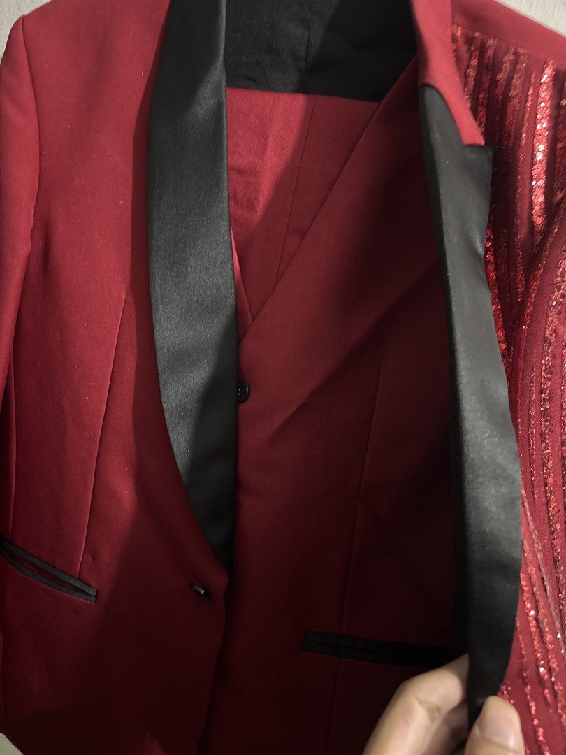 FOR RENT & SALE! Red Black Split Sequin Tuxedo Jacket (Category: Coats, Jackets and Outerwear) located in Makati City. Submitted by idol_station (Listing ID 1466107074, Image 2). Description: FOR RENT & FOR SALE FREESIZE MOP: GCASH MOD: Lalamove or pick up - Bold red and black split design with one solid side and one sequined side - Elegant black satin lapels and pocket trim - Classic single-button front closure - Includes a matching vest inside 