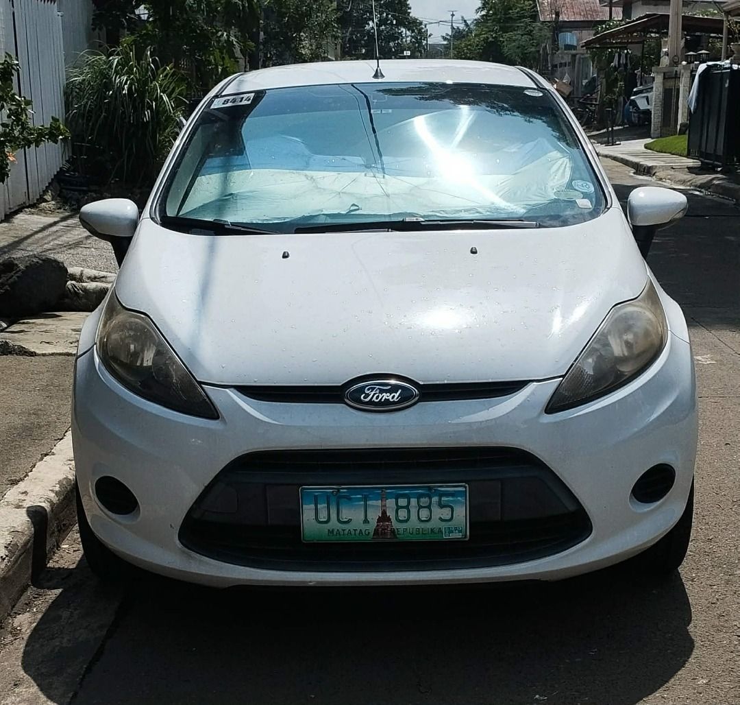 Ford Fiesta Auto (Category: Used Cars) located in Caloocan City. Submitted by yuugerard (Listing ID 1465997130, Image 1). Description: Ford Fiesta 2012. Mi: 90700. Antipolo area. Lady owner (first owner din). RFS: With a new one. License plate ending in 5 (Wed coding). Minor issue, kasi nilagyan ng cut off switch sa electricals dahil pag hinde na start ng about 2 days humihina ang battery. Other than that, all good. Walang problem sa engine, mala