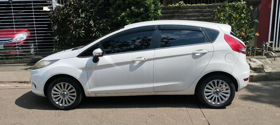 Ford Fiesta Auto (Category: Used Cars) located in Caloocan City. Submitted by yuugerard (Listing ID 1465997130, Image 3). Description: Ford Fiesta 2012. Mi: 90700. Antipolo area. Lady owner (first owner din). RFS: With a new one. License plate ending in 5 (Wed coding). Minor issue, kasi nilagyan ng cut off switch sa electricals dahil pag hinde na start ng about 2 days humihina ang battery. Other than that, all good. Walang problem sa engine, mala