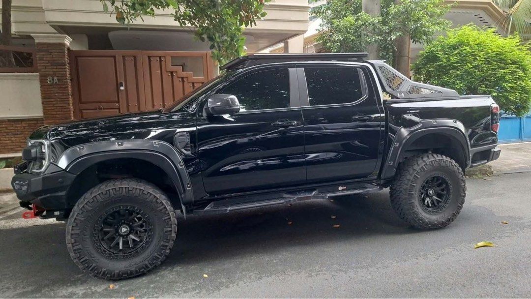 Ford Ranger (Category: Used Cars) located in Makati City. Submitted by galekris (Listing ID 1465993873, Image 2). Description: Customized Car For Sale! Black Ford Ranger 4x4 2025. Negotiable. For more inquiries message me here or thru my mobile 09063979213! .