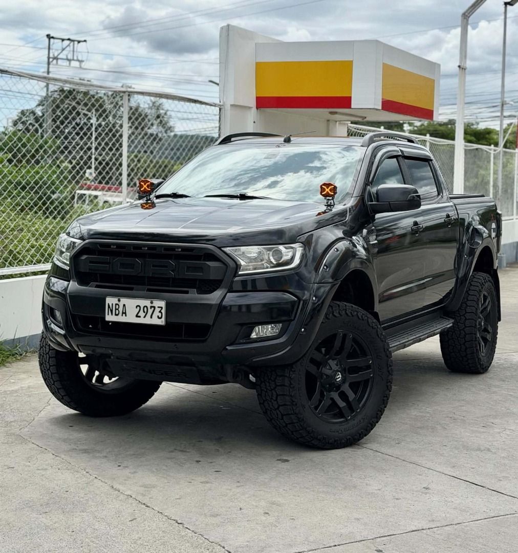 Ford Ranger (Category: Used Cars) located in Quezon City. Submitted by johnola69 (Listing ID 1466101785, Image 1). Description: FORD RANGER WILDTRAK 2.0 4x2 Automatic Bi-Turbo 2017 model: 68k low mileage. First Owned. VLAND tail lights New ditch light Nov sight installed Feb 2026 20' Fuel wheels/mags New 35x12.5x20 Venom tires Swamp thing A/T. installed Feb 2026. DOT 25 2025. 99% New Ride max 2' lift suspension + Lovelle spring New OEM Upper cont