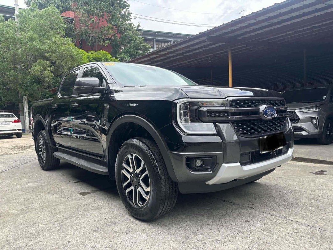 Ford Ranger Sport 2025 (Category: Used Cars) located in Kawit. Submitted by markuzmathers (Listing ID 1466059330, Image 3). Description: 2025 Ford Ranger Sport 1,410,000 only FREE interior and exterior detailing FREE transfer of ownership - 2.0L turbo diesel engine - Automatic transmission - 11k kms only - 6 plate ending Cashout: 312,600 Includes downpayment, chattel mortgage fee and partial insurance payment 5 years - 37,169 4 years - 40,667 3 y