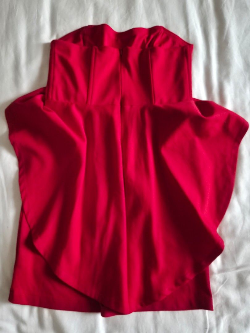 FOREVER21 Red strapless peplum mini dress (Category: Dresses) located in Quezon City. Submitted by corrnic (Listing ID 1466036593, Image 3). Description: - Color: Bright red - Style: Strapless bodycon dress with structured peplum waist and heart-shaped neckline - Closure: Exposed back zipper - Fit: Soft, stretchy fabric that hugs your curves - Measurements: 14" chest width, 14" total length - Occasion: Perfect for parties and nights out.