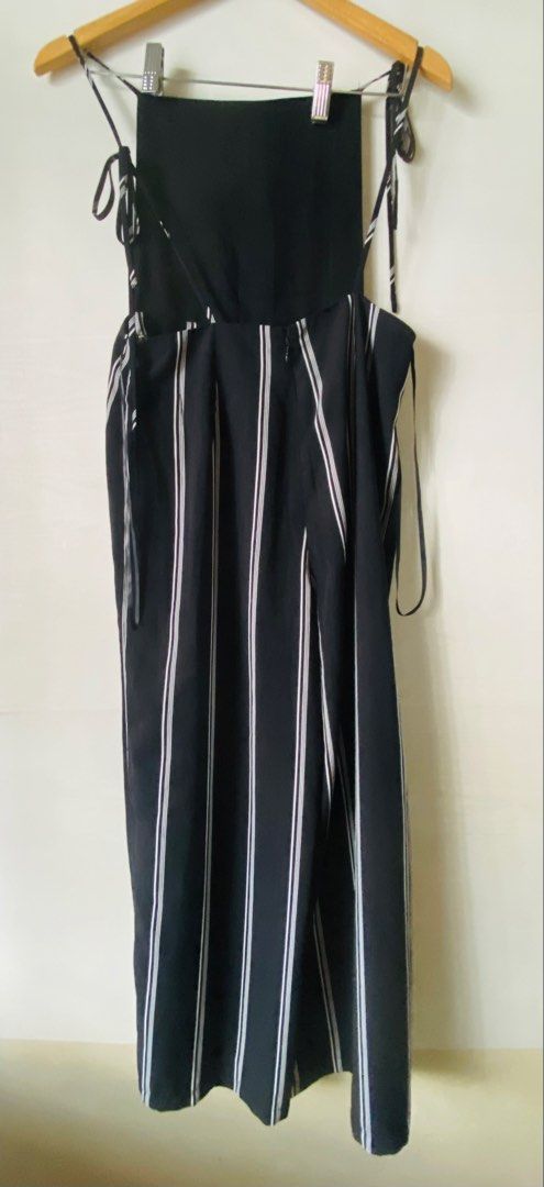 Forever 21 Jumpsuit Medium (Category: Other Bottoms) located in Pasig City. Submitted by zentushia49 (Listing ID 1466148516, Image 2). Description: Once used good as new Medium on tag Polyester Made in Vietnam 35” bottoms length Straps are adjustable Waistline upper 28”.