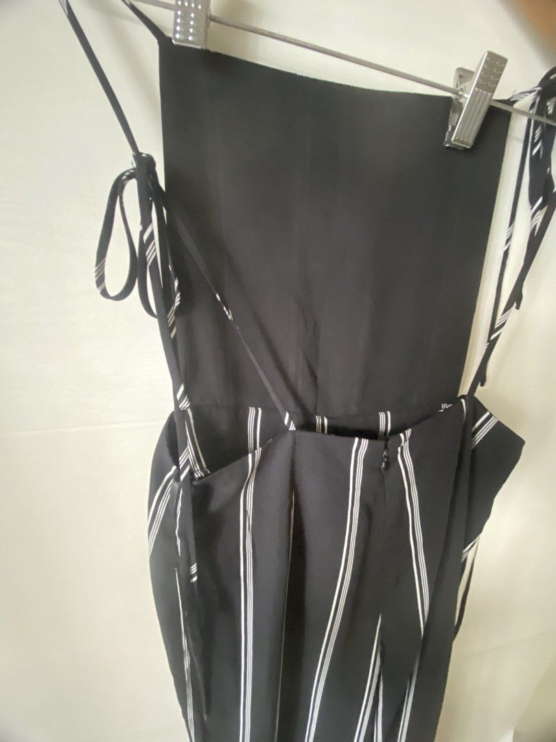 Forever 21 Jumpsuit Medium (Category: Other Bottoms) located in Pasig City. Submitted by zentushia49 (Listing ID 1466148516, Image 3). Description: Once used good as new Medium on tag Polyester Made in Vietnam 35” bottoms length Straps are adjustable Waistline upper 28”.