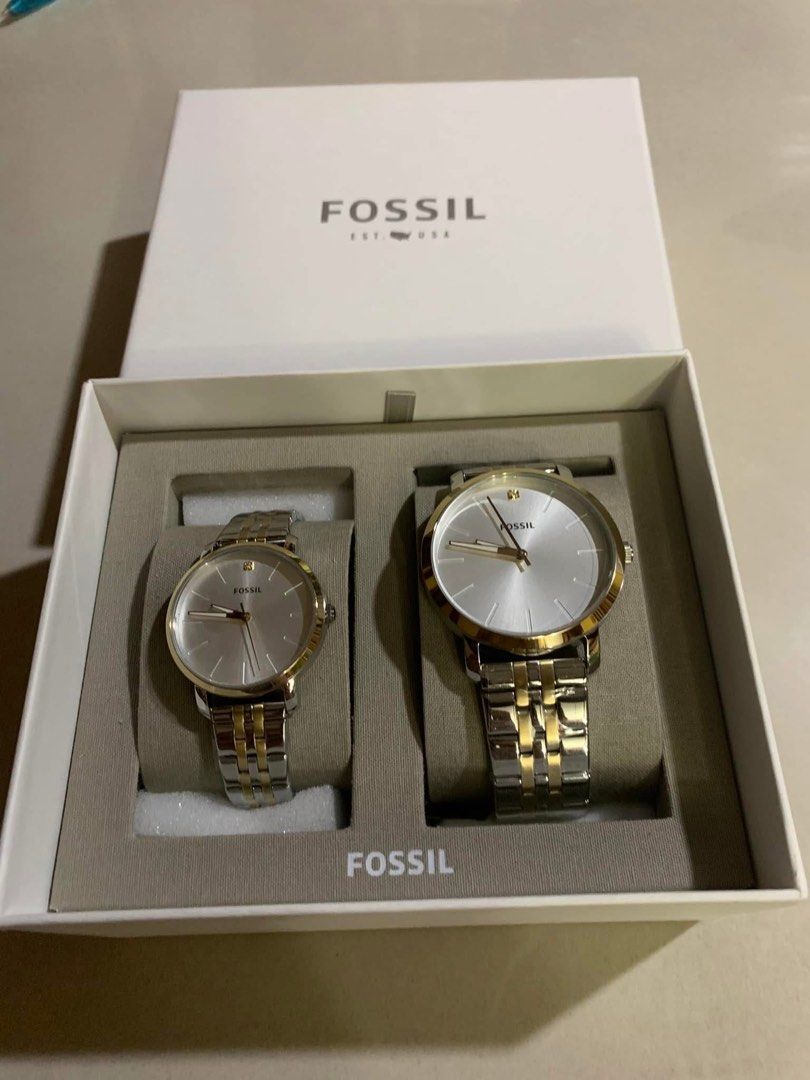 Fossil Couple Watch Set BQ2467SET (Category: Women's Watches) located in Manila. Submitted by delmundoem21114 (Listing ID 1465967708, Image 2). Description: - Brand new with tags attached, never worn - Model: Fossil BQ2467SET (Couple Watch Set) - Elegant silver dials with stylish gold and silver tone stainless steel straps - Matching pair design ideal for partners - Includes original white Fossil box.