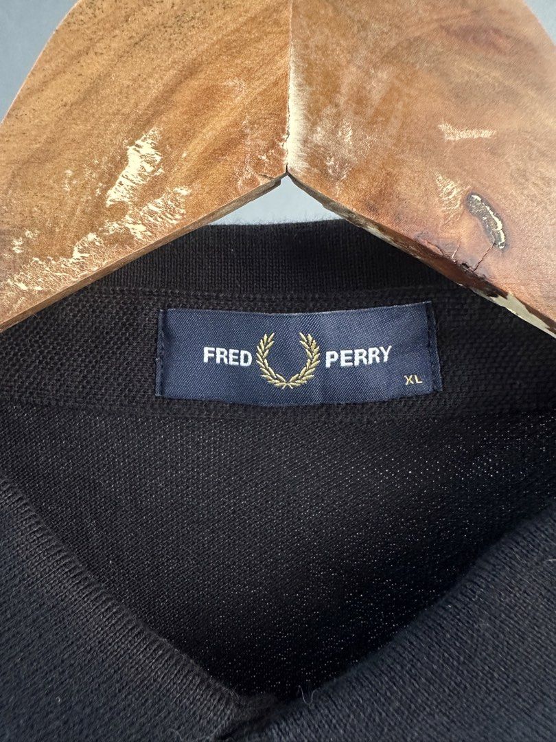 Fred Perry - Twin-tip Polo shirt (Category: Tshirts & Polo Shirts ) located in Pasig City. Submitted by worn2wice (Listing ID 1466007048, Image 3). Description: Size XL Measurements (in) Width 22 Length 30 Sleeve Length 9.5 Excellent condition Issue: No copyright infringement intended. This post is for resale purposes only. All trademarks, logos, and brand names belong to their respective owners. .