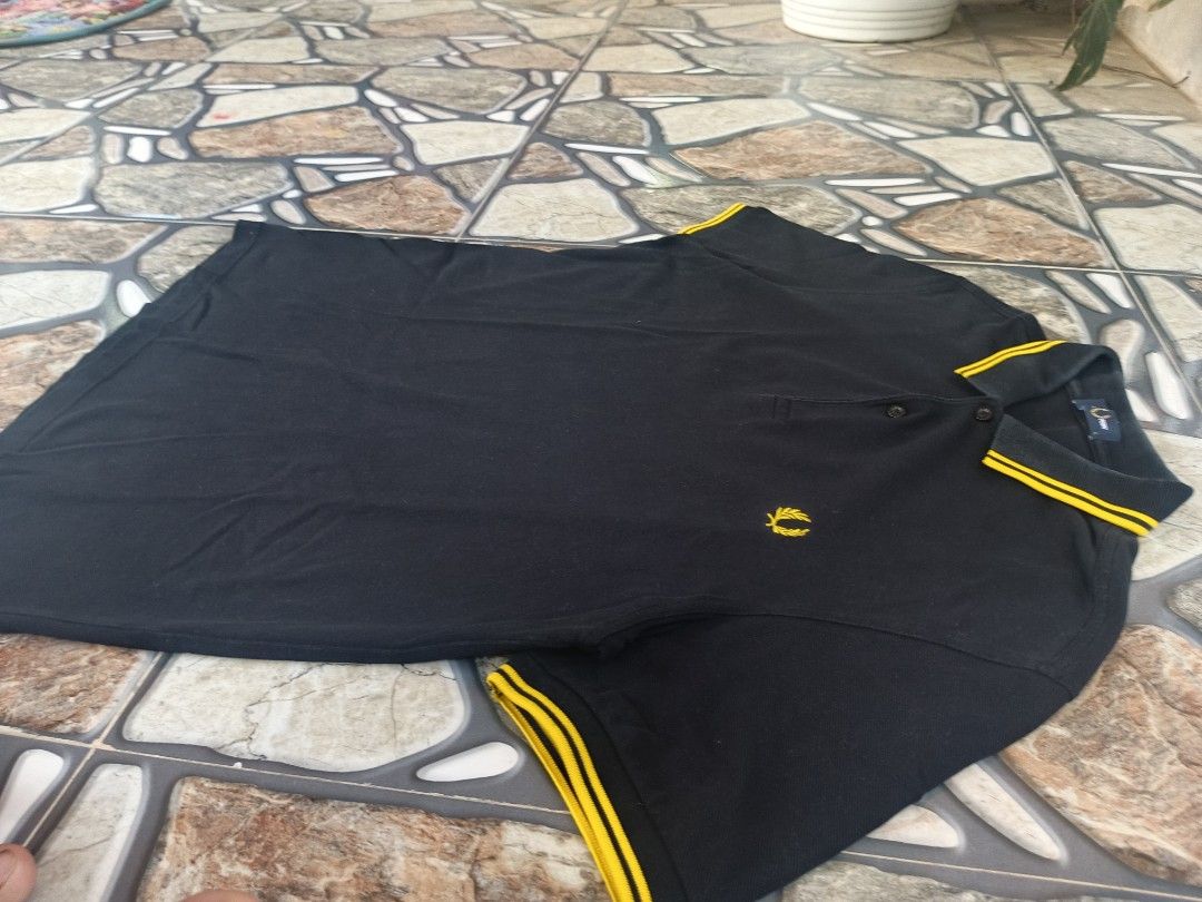 Fred Perry polo shirts (Category: Activewear) located in Baggao. Submitted by thriftislife123 (Listing ID 1466036063, Image 3). Description: w:20 l:29 issue:minimal fade sa collar off/legit pm for more details.