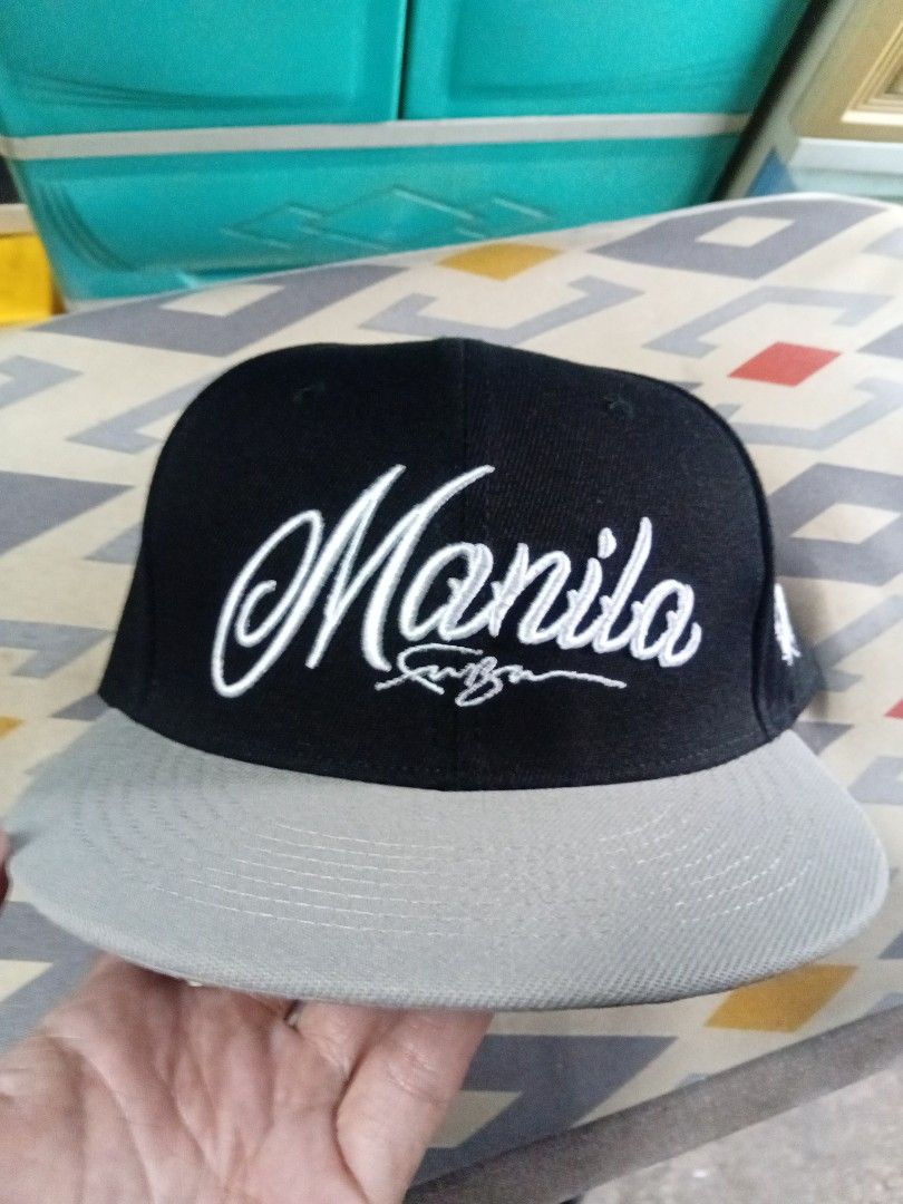 Fubu Snapback Cap (Category: Caps & Hats) located in Binangonan. Submitted by ohdievald38664 (Listing ID 1466032910, Image 1). Description: - Authentic - Purchased on August 20, 2026 on Fubu Flagship Store - Used like new. Isang beses lang nagamit. - Size: OSFM - Embroidered logo & design - Color: Black, Brim: Gray - 100% Cotton - No issue - RFS: Needs fund. - Location: Binangonan, Rizal Message if interested..