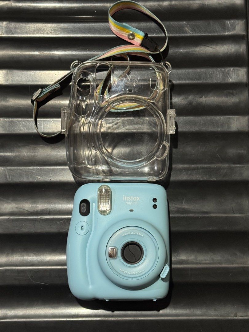 Fujifilm Polaroid Instax Mini 11 (Category: Cameras) located in Cebu City. Submitted by generous.penguin (Listing ID 1466126392, Image 1). Description: Inclusions: -Original protective case -Original lanyard RFS: Upgrade.