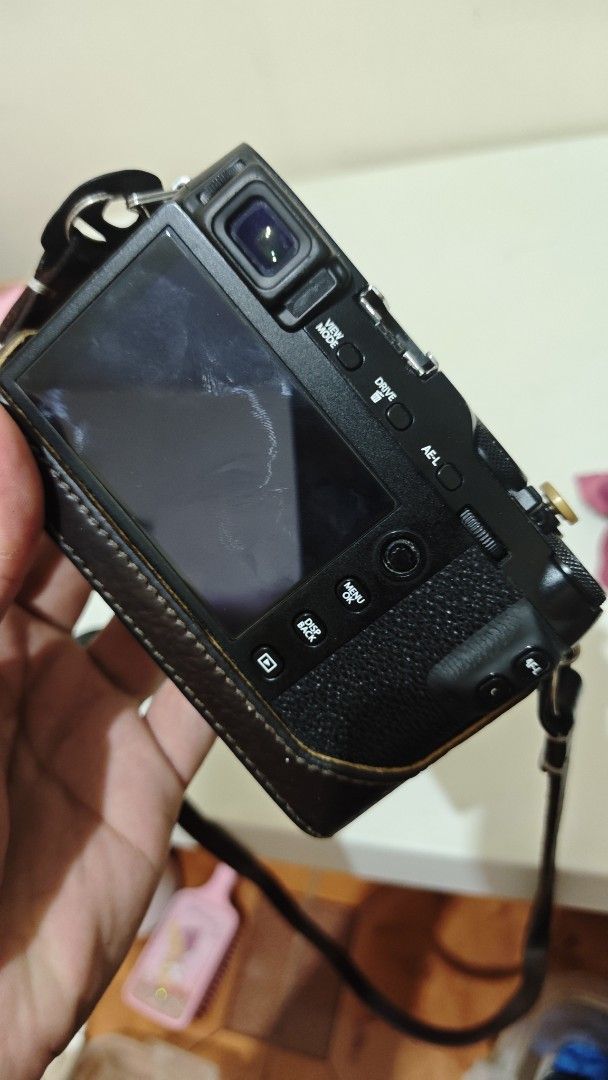 Fujifilm X-E3 Mirrorless Camera Bundle with Lens and Flash (Category: Cameras) located in Manila. Submitted by eyey02 (Listing ID 1466138054, Image 3). Description: - Fujifilm X-E3 mirrorless camera body in stylish brown leather half case - Includes lens with front cap, battery, battery charger, dedicated flash unit, and strap - Features tactile shutter speed and exposure compensation dials, plus a hot shoe mount - Clean rear screen and sensor - 
