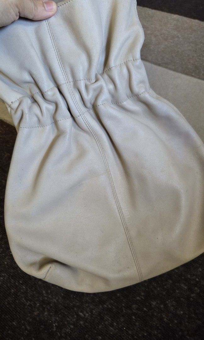FURLA soft leather bucket bag (Category: Luxury Bags & Wallets) located in Pagudpud. Submitted by jmpascual044757 (Listing ID 1466101390, Image 2). Description: 100% guaranteed original !!! made of genuine leather some scuffs and stains on leather discollration and faded hardware clean interior please check individual pics still in decent condition no to maarte pass sa barat no free sf initially posted for 900, reduced to 400.