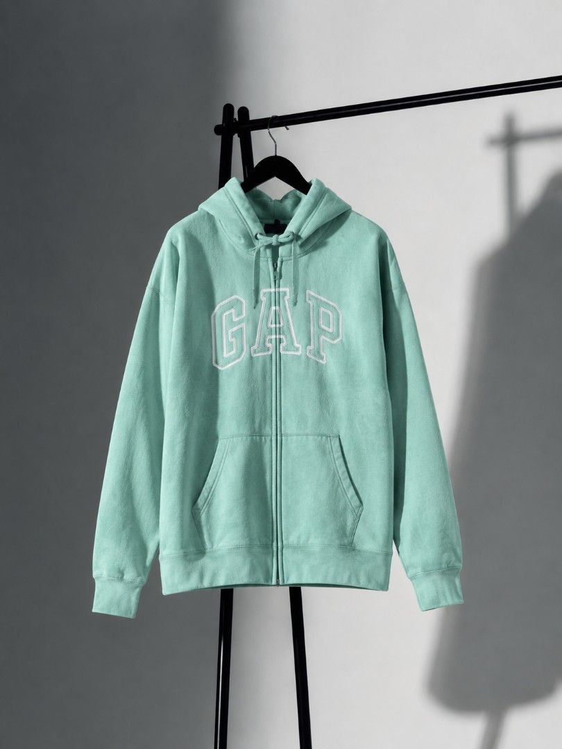 GAP Mint Green Hoodie Zip Up Jacket (Category: Coats, Jackets and Outerwear) located in Imus. Submitted by brightgem.de2dc2 (Listing ID 1466051079, Image 1). Description: GAP Mint Green Hoodie Zip Up Jacket Slightly Used With Visible Ink Stain on the right side.
