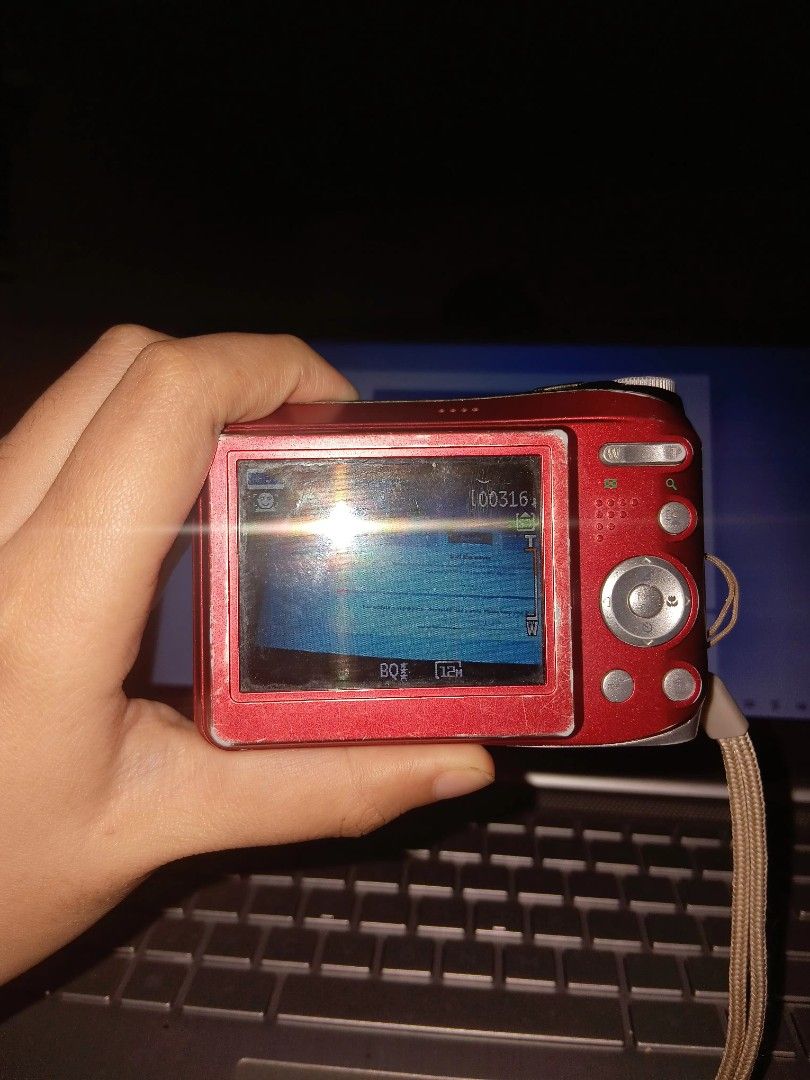GE A1250 12.2 Megapixel Digital Camera Red (Category: Cameras) located in Taguig. Submitted by mikacxz (Listing ID 1466073192, Image 2). Description: - Model: GE A1250 Digital Camera -LCD Burn/Screen Issues -Comes with battery, charger, and SD card - Resolution: 12.2 Megapixels with 5x optical zoom - Condition: Tested and fully working (screen, buttons, battery compartment) - Aesthetic: Customized with cute stickers all over the body - Inclusions