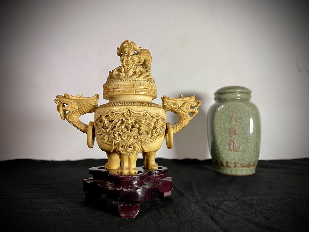 Genuine ævoree (Category: Vintage Collectibles) located in Marikina City. Submitted by sam_illano (Listing ID 1466114508, Image 1). Description: Antique dragon and gargoyle incense burner intricately carved from solid ævoree. Measures 6” wide, 5” tall (6” total height including the wood base). Issue with 1 minor chip / damage as shown in the 8th photo. Selling low @ P25,500. Guaranteed authentic ivory material with visible haspe (schreger lines).