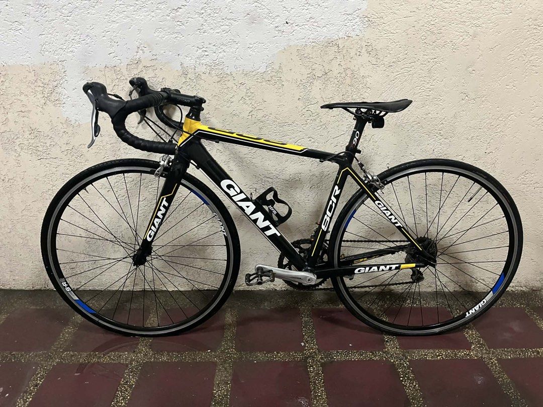 Giant SCR road bike (Category: Bicycles) located in Bacoor. Submitted by jadooo (Listing ID 1466148291, Image 1). Description: Size Small 46/50 FSA Omega Crank pressfit BB Giant SR2 rimset EC90 carbon seatpost EC90 saddle 10 speed Tiagra groupset (STI,RD,FD,cogs and chain) RFS: di na nagagamit PM for details Bacoor meet up/pick up.