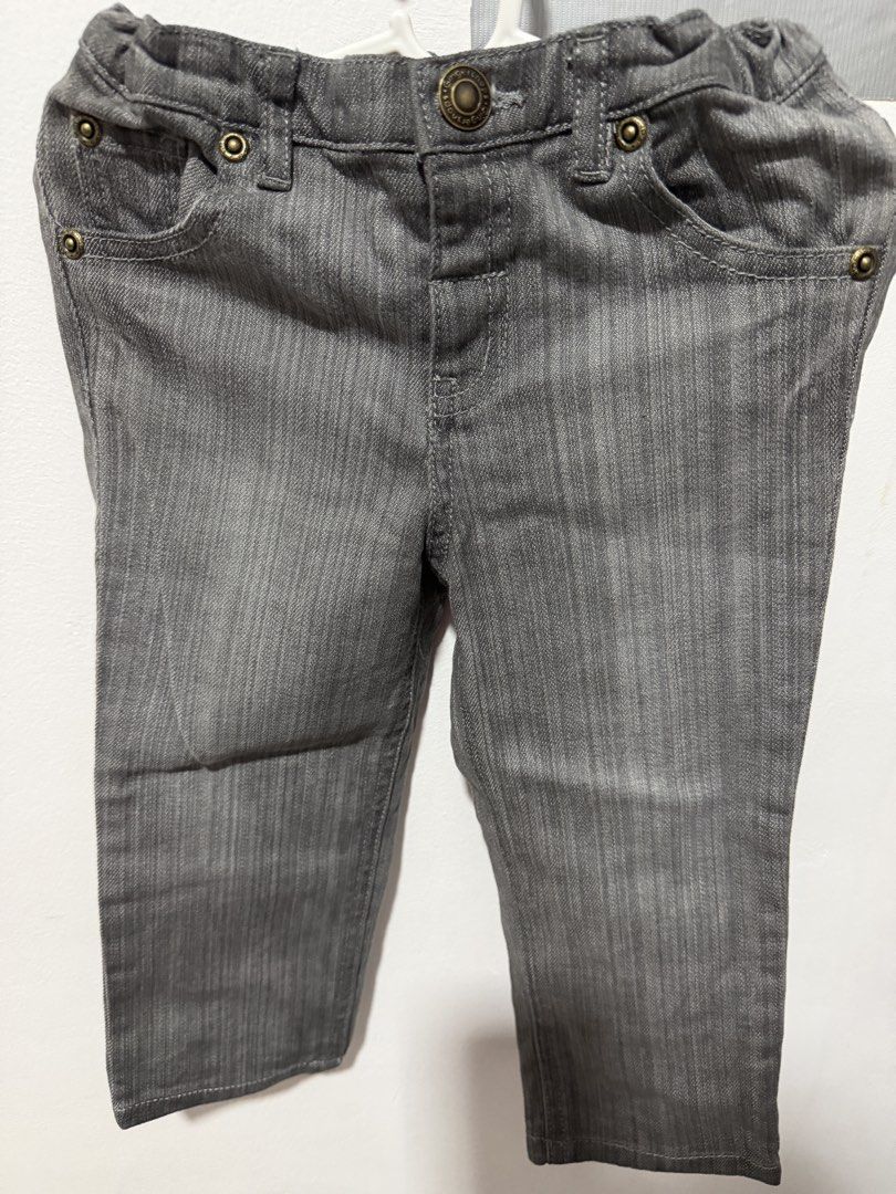 Gingersnaps Baby Boy Jeans Size 24 (Category: Jeans) located in Bocaue. Submitted by graceeshoppe (Listing ID 1466142706, Image 1). Description: - Brand: Gingersnaps - Item: Gray denim pants - Size: Baby boy 24 - Features: Classic button closure, front pockets, textured fabric - Comfort: Elastic waistband at the back for easy dressing - Condition: Clean and ready to wear.