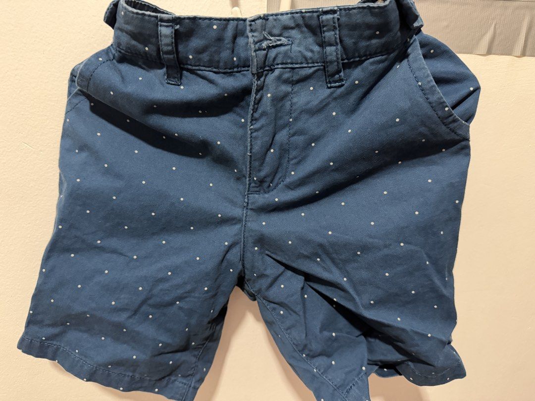Gingersnaps Boys Polka Dot Shorts Size 4 (Category: Babies & Kids Fashion) located in Bocaue. Submitted by graceeshoppe (Listing ID 1466142043, Image 1). Description: - Brand: Gingersnaps - Size: Boys Size 4 - Design: Blue with all-over white polka dots - Waistband: Elastic in the back with belt loops - Pockets: Convenient front pockets - Style: Casual everyday wear, easy to match with tees.
