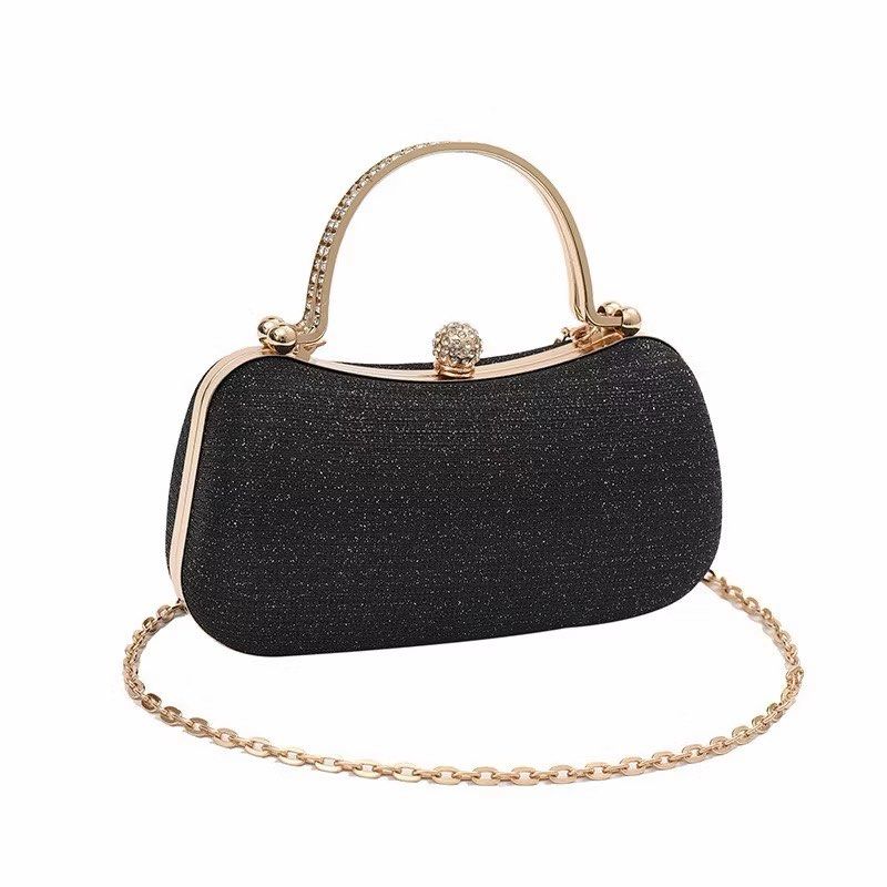 Glitter Evening Clutch Bag With Chain Strap And Handle (Category: Clutches) located in Makati City. Submitted by missinnahco (Listing ID 1466060757, Image 3). Description: Colors available: 🔸 Gold 🔸 Silver 🔸 Black 🔸 Pink ✨ Design: Hard shell with glitter finish, metal top handle, and crystal clasp ✨ Free detachable gold chain strap ✨ Dimensions: 22cm x 11cm with an 8cm handle drop ✨ Perfect for evening events, dinners, weddings, and parties.