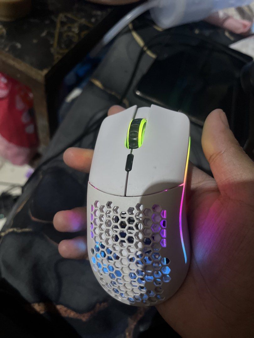 Glorious Model O & Model O Minus Wireless Mice Bundle (Category: Mouse & Mousepads) located in Quezon City. Submitted by alyxxz (Listing ID 1466019727, Image 3). Description: - Brand: Glorious - Items: Model O Wireless (Black) & Model O Minus Wireless (White) - Design: Lightweight honeycomb shell with vibrant RGB lighting - Condition: Fully tested and 100% working - Inclusions: Wireless adapters, extension dongles, and braided charging cables.