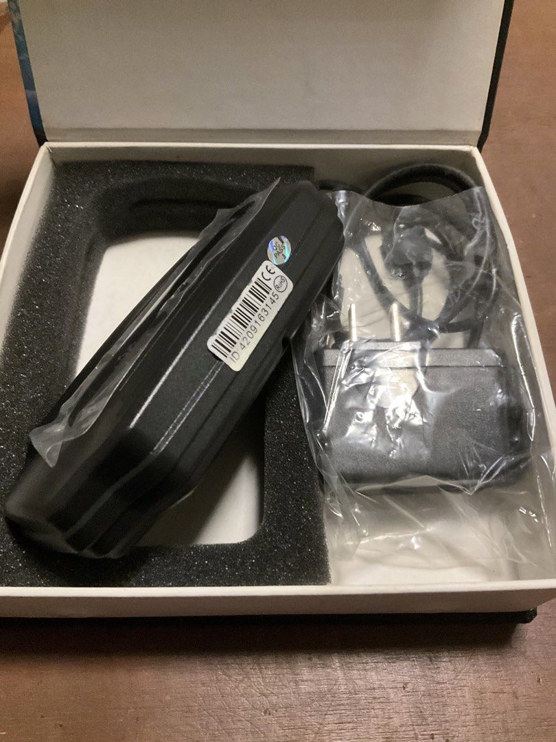 GPS Tracker GSM/GPRS/GPS Car Vehicle Tracking Device (Category: Security Systems & CCTV Cameras) located in Manila. Submitted by happy564 (Listing ID 1466078086, Image 3). Description: - Brand new GPS tracker for vehicles - Sleek black finish with protective plastic still intact - Includes power adapter (with protective plastic) and original box - Ideal for enhanced vehicle security and real-time monitoring.