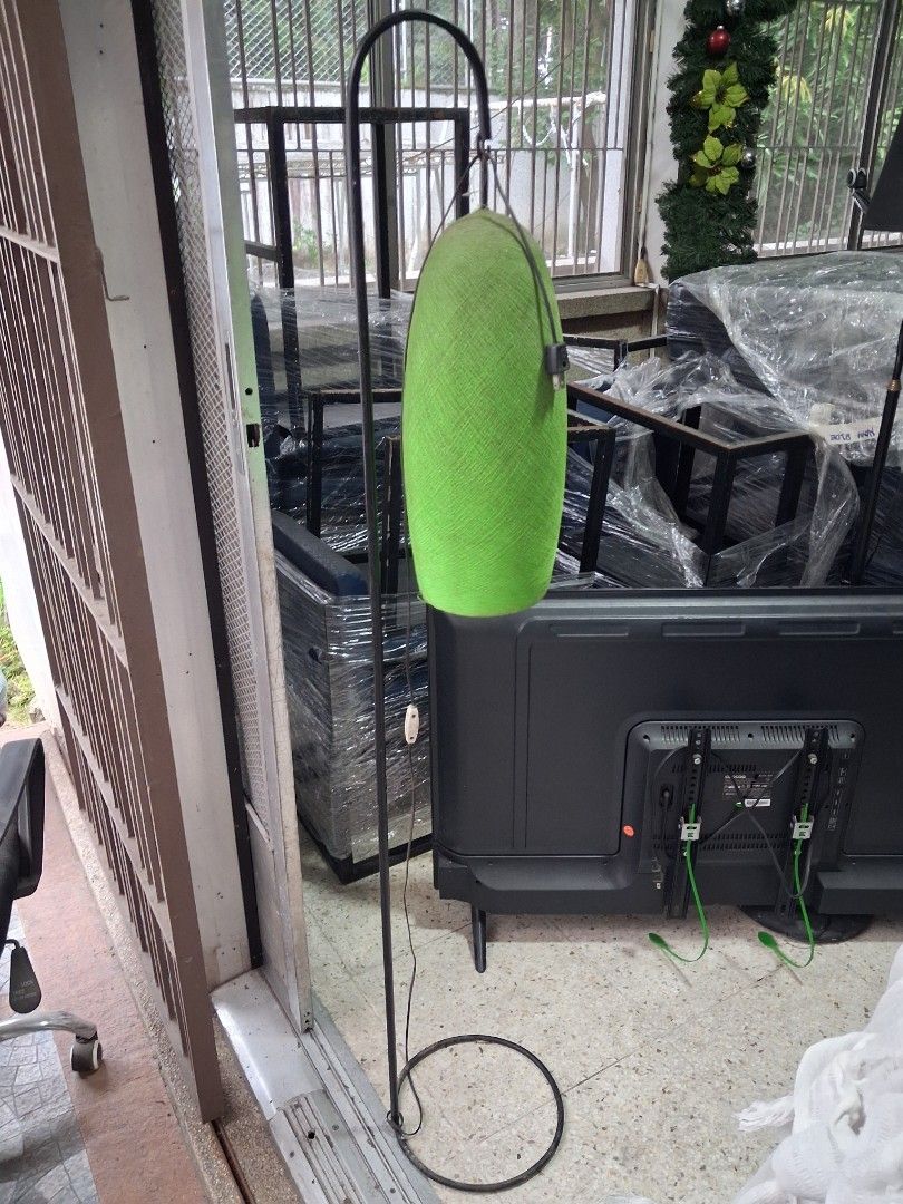 Green fabric shade arc floor lamp (Category: Lighting) located in Taguig. Submitted by ssvcn (Listing ID 1465975595, Image 1). Description: - Unique curved metal stand design - Vibrant green oval shade wrapped in fabric - Emits a warm and cozy glow when turned on - Long black cord with a convenient inline switch - Simple and quick setup - Perfect fit next to a couch or armchair.