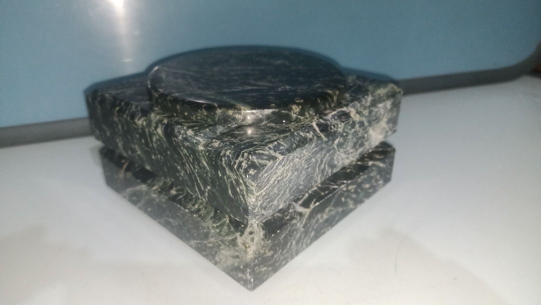 Green marble square ashtray with removable round insert (Category: Vases & Decorative Bowls) located in Munoz. Submitted by larryc1212 (Listing ID 1466116664, Image 1). Description: - Material: Solid green marble with natural glossy texture and unique veining - Design: Heavy square base with a matching removable round center insert - Condition: Nice vintage piece - Use: Functional smoker accessory or stylish home decor - Shipping: Ships securely 