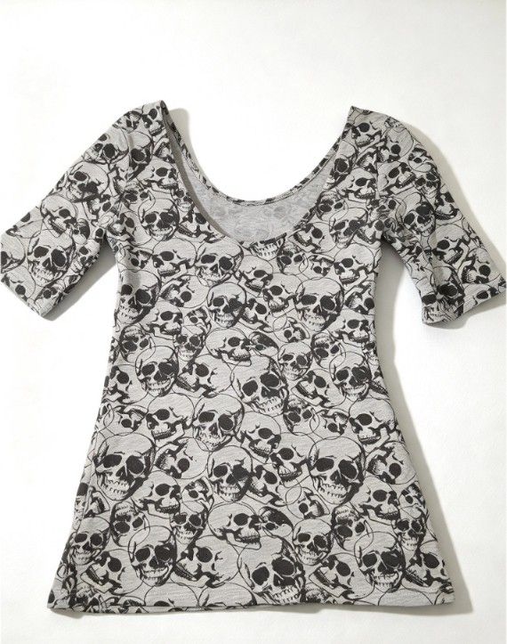 Grey Skull Print Scoop Neck Top (Category: Blouses) located in Rizal. Submitted by hawt_sawl (Listing ID 1466089973, Image 1). Description: Grey cotton top with an all-over black skull pattern. Scoop neckline with short sleeves. Slim fit through the body. Bold graphic print. Great piece for casual alternative outfits..