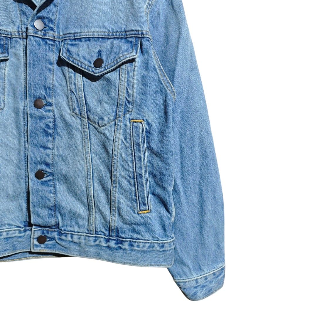 GU Denim Trucker Jacket (Category: Coats, Jackets and Outerwear) located in Quezon City. Submitted by oldturnedtogold (Listing ID 1466003614, Image 3). Description: GU Denim Trucker Jacket Size Medium Light Blue denim Shoulder Width - 19.5" Body length - 24.5" Chest Width - 22.5" Sleeve Length -23" Details: - 100% cotton fabric - Boxy fit - Type III construction with buttoned front closure, and vertical seam details - 2 chest pocket with flap clo