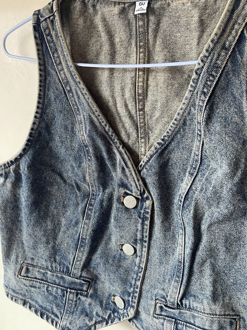 GU Denim Vest Blue (Category: Sleeveless) located in Calamba. Submitted by everyday.closet (Listing ID 1466016916, Image 2). Description: - Brand: GU - Size: Medium (M) - Color/Wash: Medium blue with acid wash finish - Details: Button-front closure with metal buttons, two front pockets, V-neckline, and paneled back seams - Origin: Made in Bangladesh - Condition: Great vintage look.