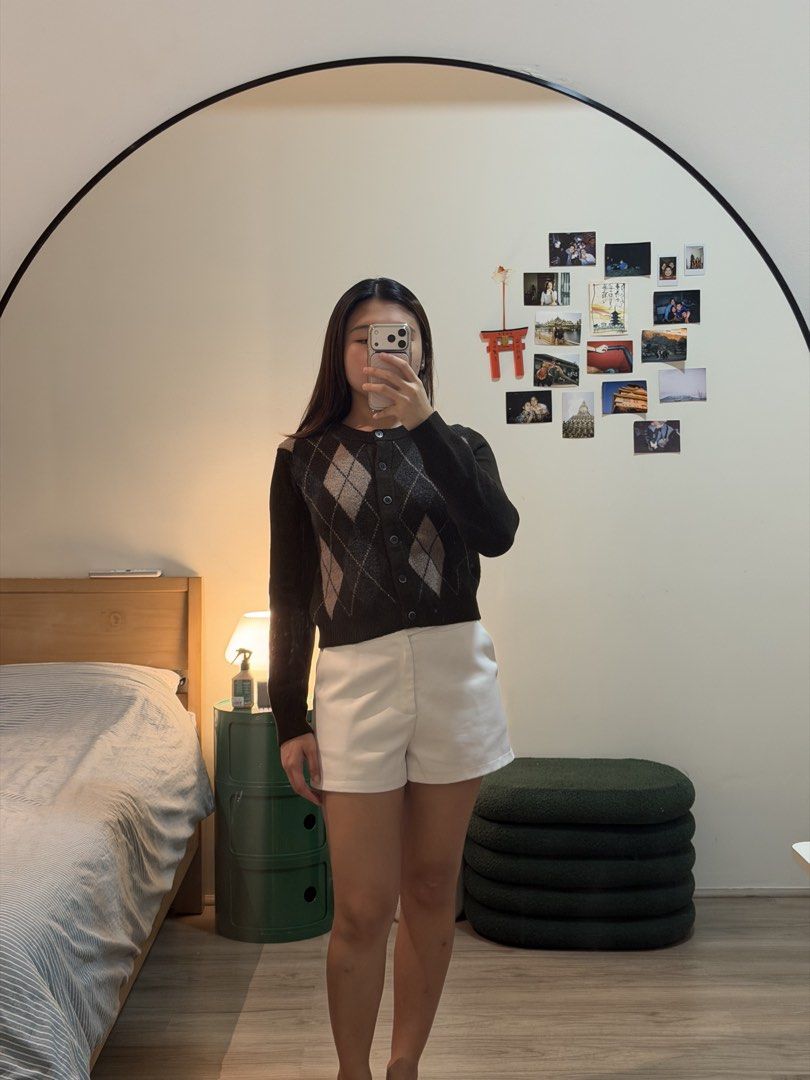 GU Pattern Button Cardigan (Category: Coats, Jackets and Outerwear) located in Cebu City. Submitted by wearhousebyhya (Listing ID 1466022072, Image 1). Description: WORN ONLY ONCE IN JAPAN - Style: Vintage-inspired argyle cardigan - Color: Black and brown - Fit: Cropped and fitted - Details: Button-down front, round neckline, long sleeves - Material: Soft, comfortable knit - Perfect for: Easy pairing with shorts or skirts.