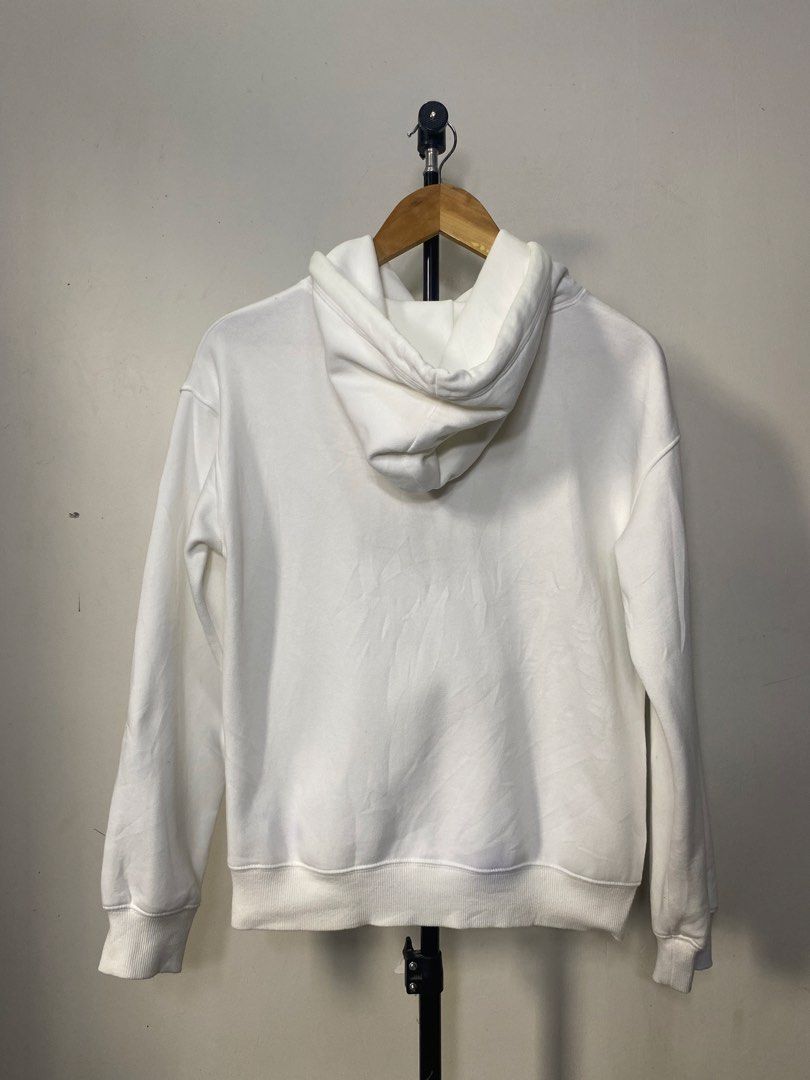 GU White Hoodie (Category: Hoodies) located in Cabanatuan. Submitted by topandbottomph (Listing ID 1466038733, Image 3). Description: - Brand: GU - Color: Plain White - Size: M - Material: Comfortable cotton blend - Details: Hood with drawstrings, front kangaroo pocket, ribbed cuffs and hem - Condition: Clean overall shape Dimes: 22x20 ✨ Good condition 💰₱349 ONLY! 💳 MOP: GCash / MariBank / BDO 📦 MOD: J&T 📌 Cabanatuan City, Nueva Ecija 📸 1st 