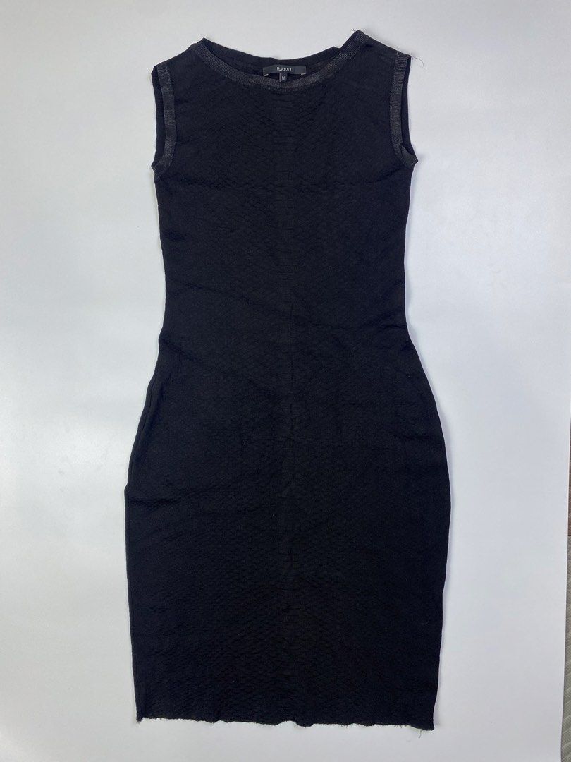 Gucci - Embossed Python SnakeSkin Dress (Category: Luxury Apparel) located in Dasmarinas. Submitted by goodbuyartisanal (Listing ID 1466048958, Image 3). Description: Gucci - Embossed Python Snakeskin Dress size Medium. Width 14 inches Length 36.5 inches Hem 16.5 inches Excellent Condition Price : 6,000 + ship Pm me.
